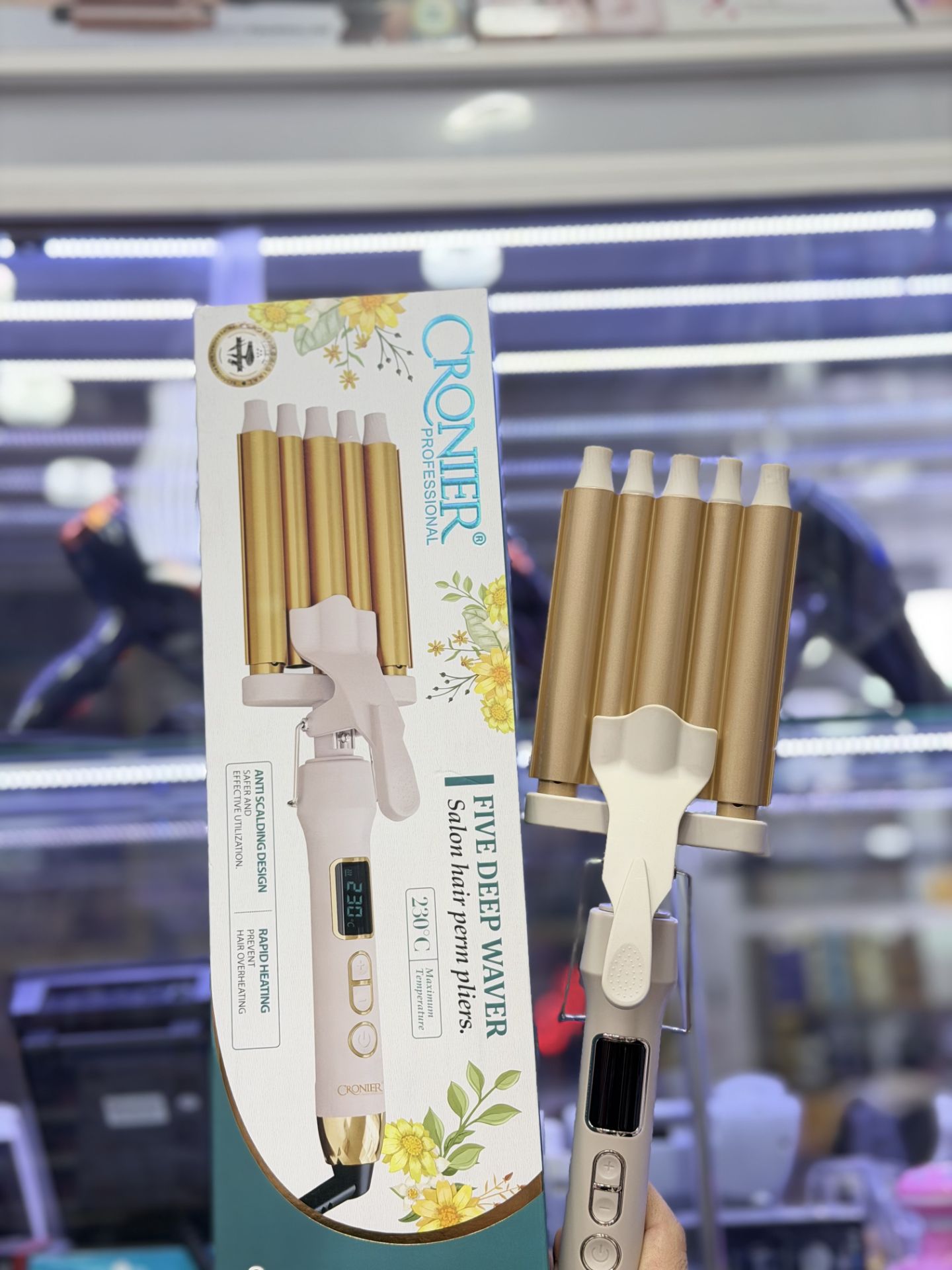 فر کننده و حالت دهنده مو کرونیر مدل CR-2069– ایجاد فرهای عمیق سالنی با ۵ میله طلایی و دمای ۲۳۰ درجه